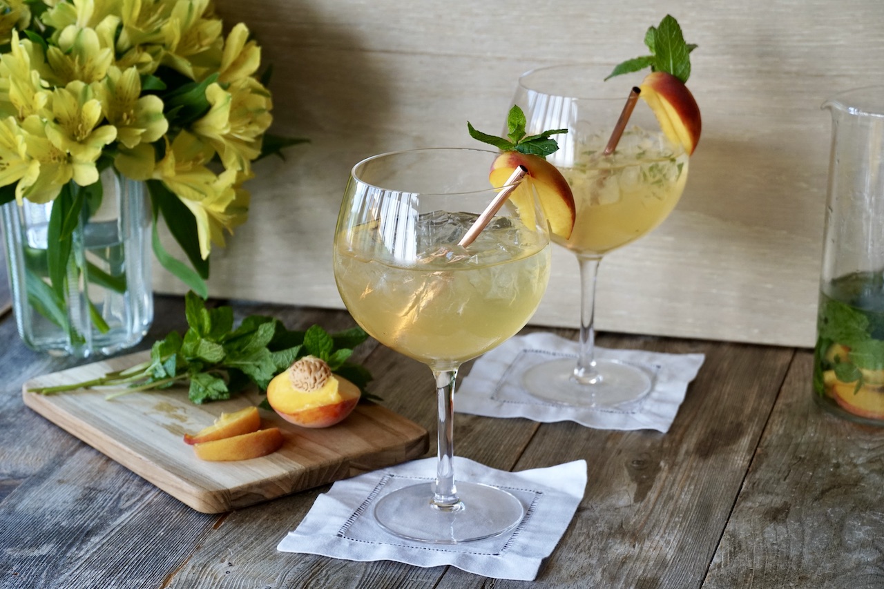 Minted White Sangria served on ice.