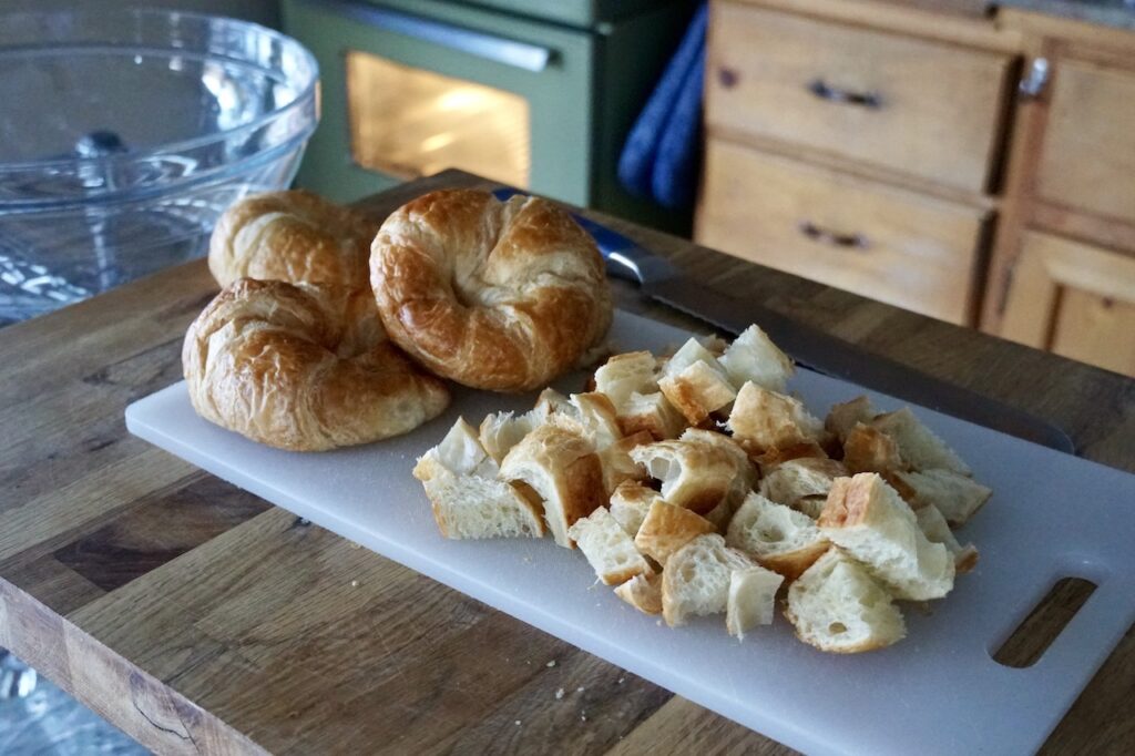 The croissants cut into bite-size pieces.
