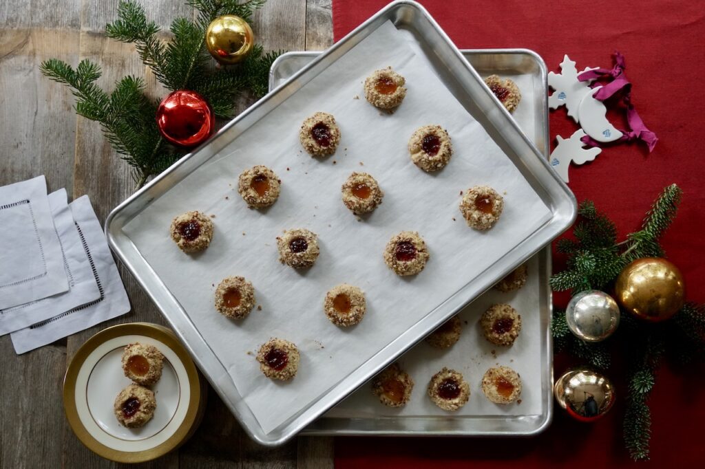 Two trays of Nutty Thumbprint Cookies, ready to be enjoyed.