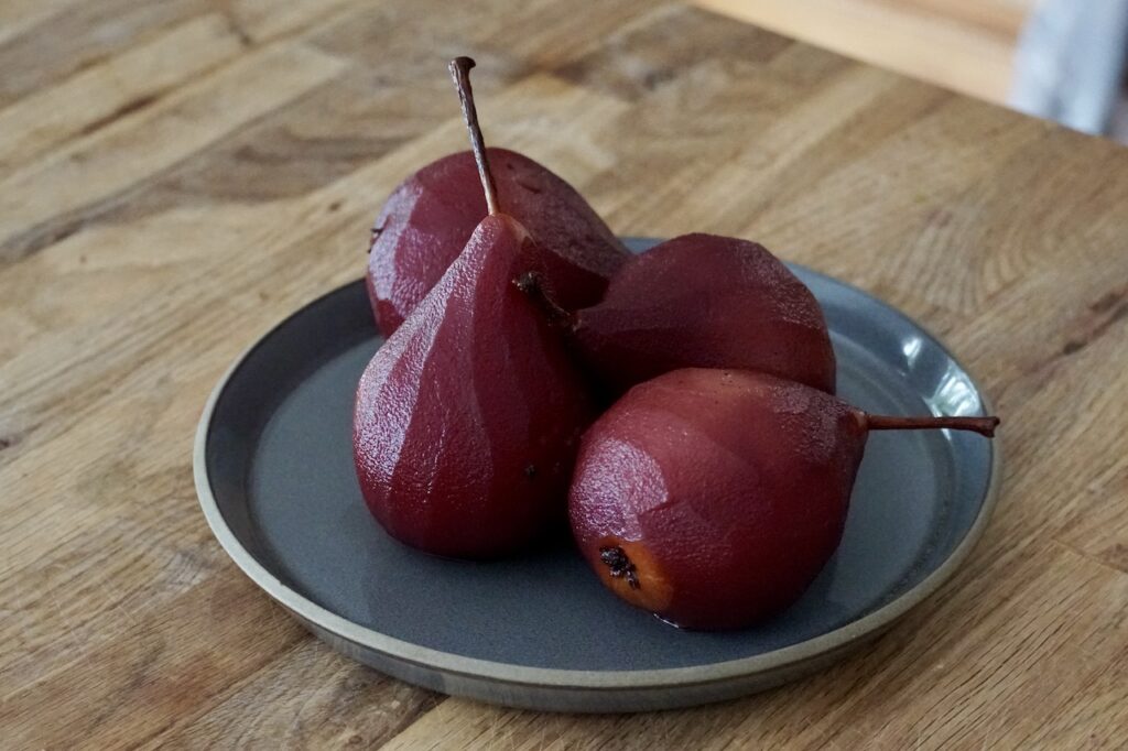 The poached pears fresh out of the pot.