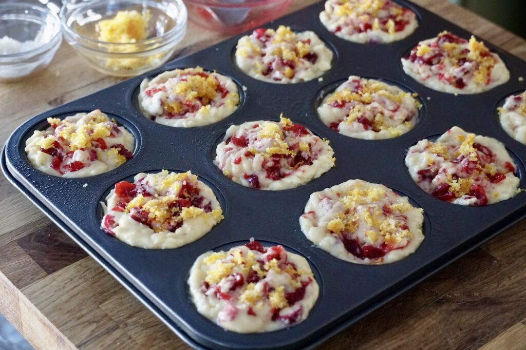 The tray of cranberry-orange muffins ready for the oven.
