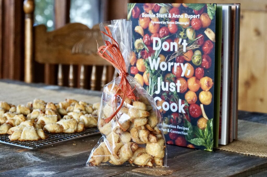 Bonnie Rugelach cookies, assembled in a cello bag alongside her book, Don't Worry, Just Cook.