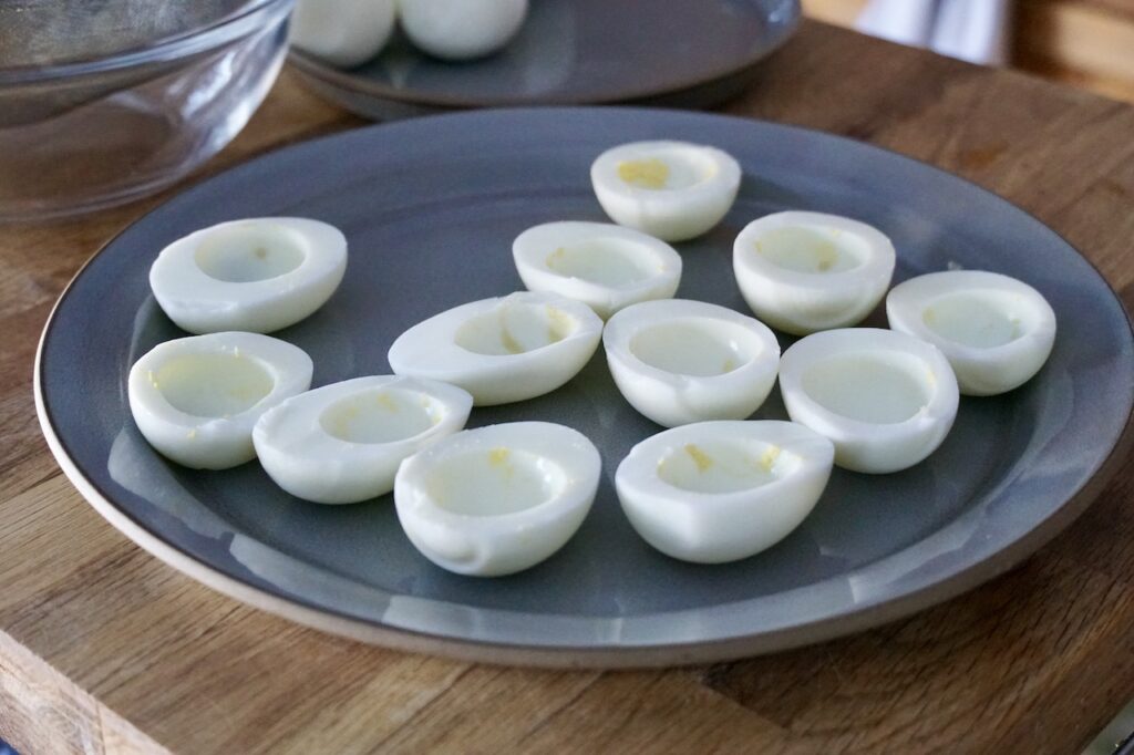 The hard-boiled egg whites assembled on a plate.