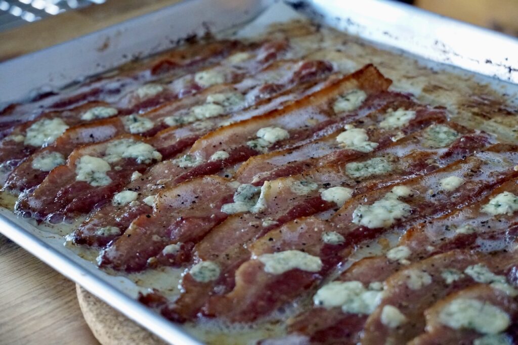 A baking sheet with Oven-baked Crispy Bacon.