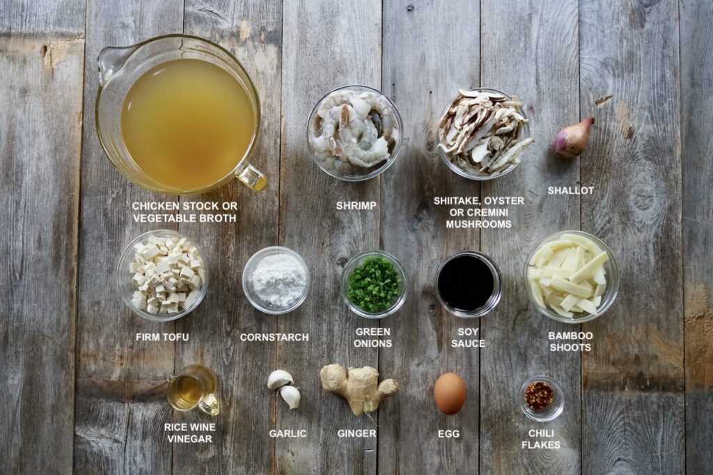 All of the various ingredients needed to make a hot and sour soup.