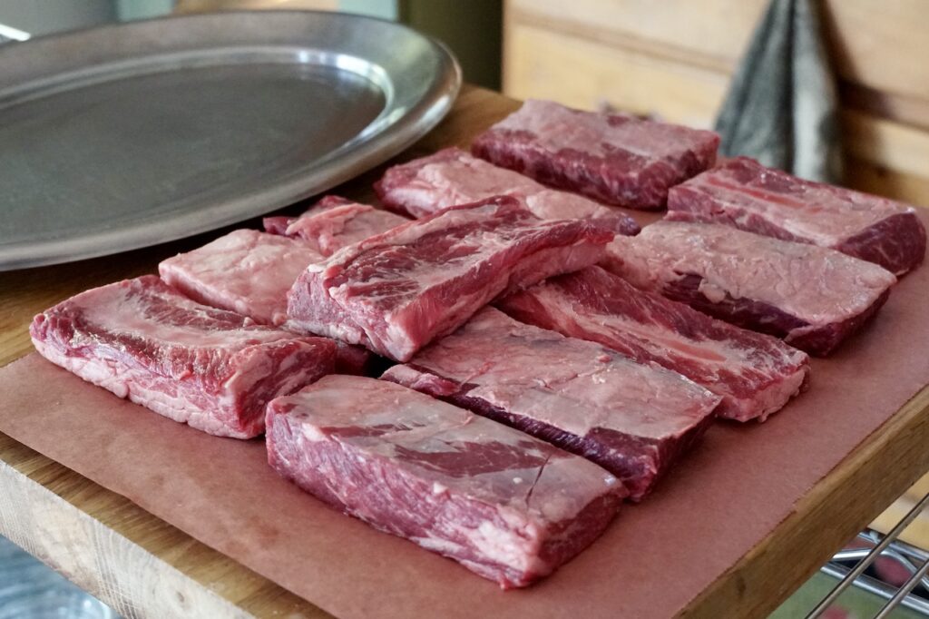 The beef short ribs with the rib bones removed.