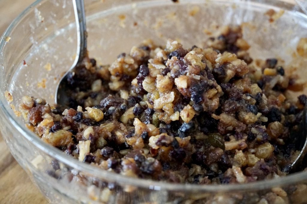 A large bowl containing the mincemeat mixture.