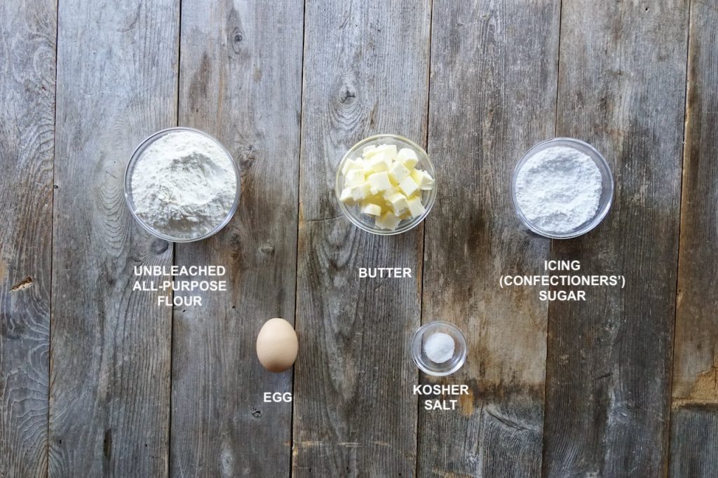 Ingredients for the shortcrust pastry include flour, icing sugar, kosher salt, butter and an egg yolk.