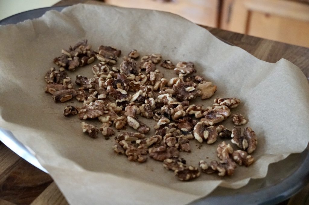 Walnut halves after being toasted.