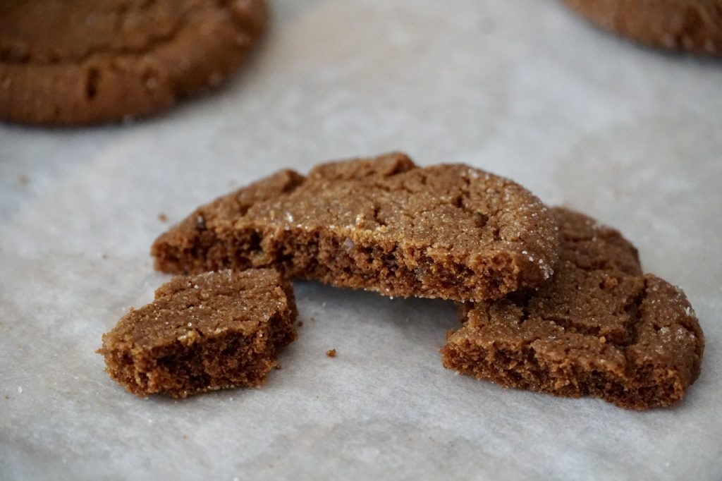 A cookie split open to show the sift, tender interior.