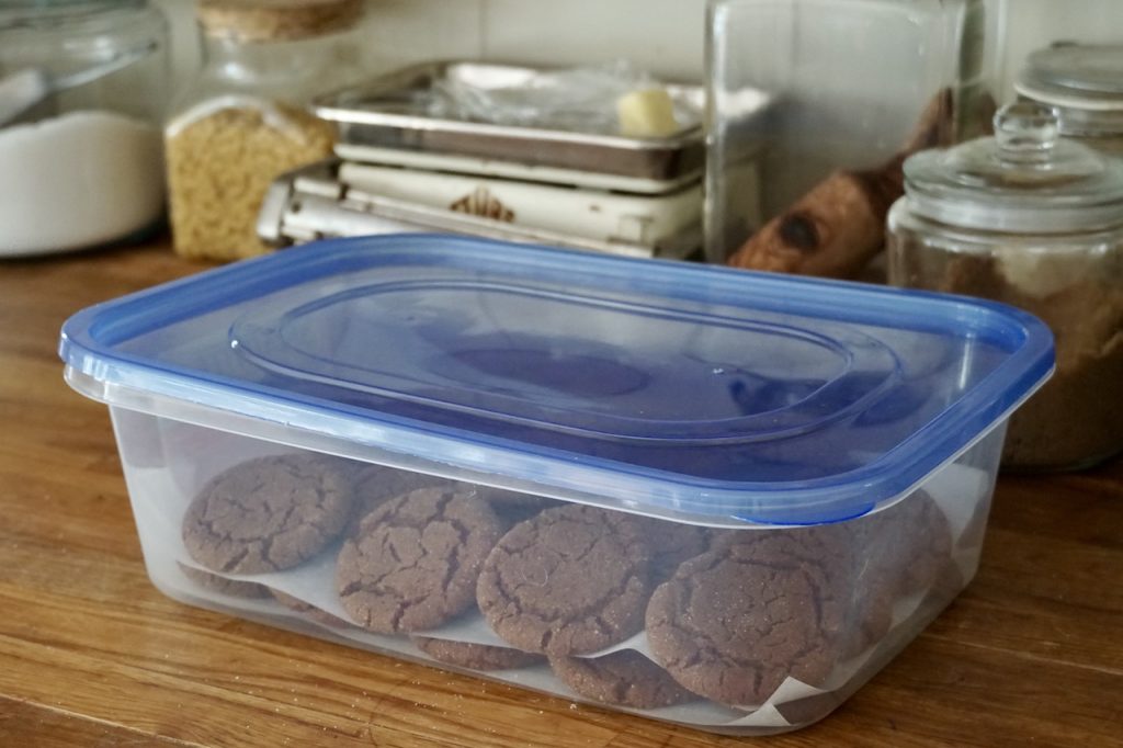 The ginger cookies stored in an airtight container.