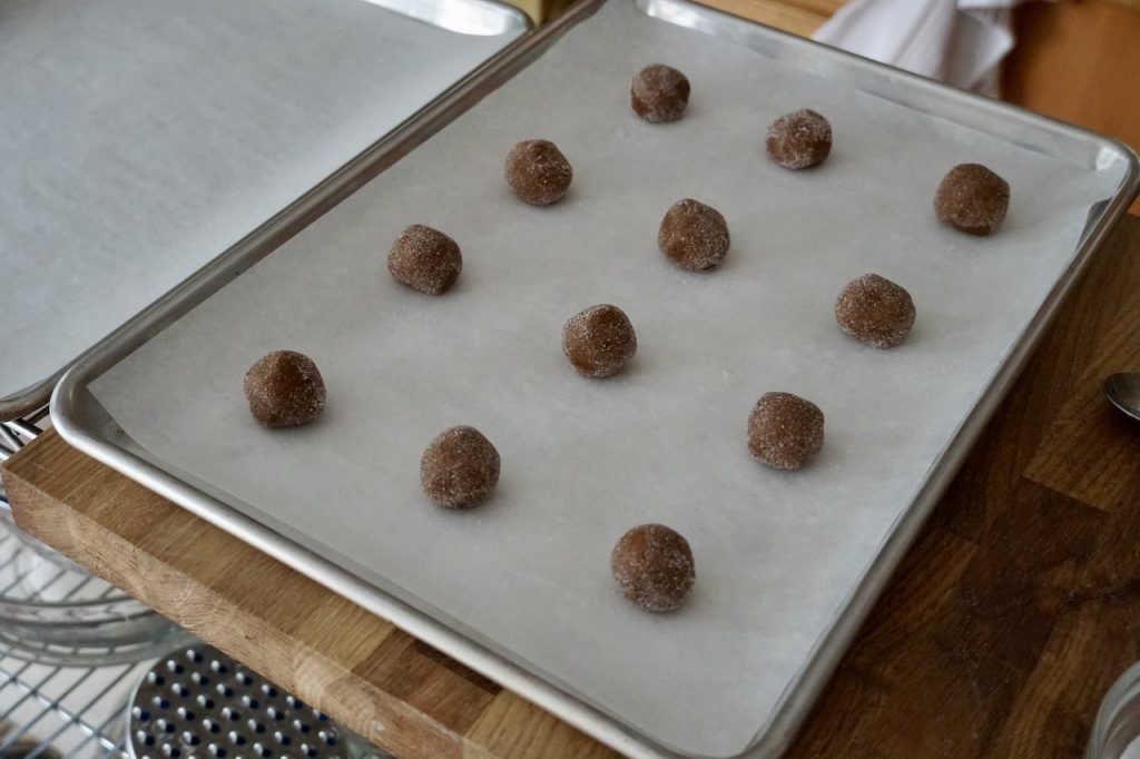 The ginger cookies rolled into balls then, rolled in granulated sugar.