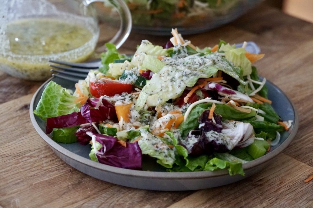 A healthy salad of assorted vegetables drizzled with a creamy Italian dressing recipe.