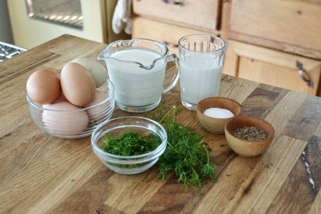 Ingredients for the custard include: eggs, milk, cream and fresh dill.