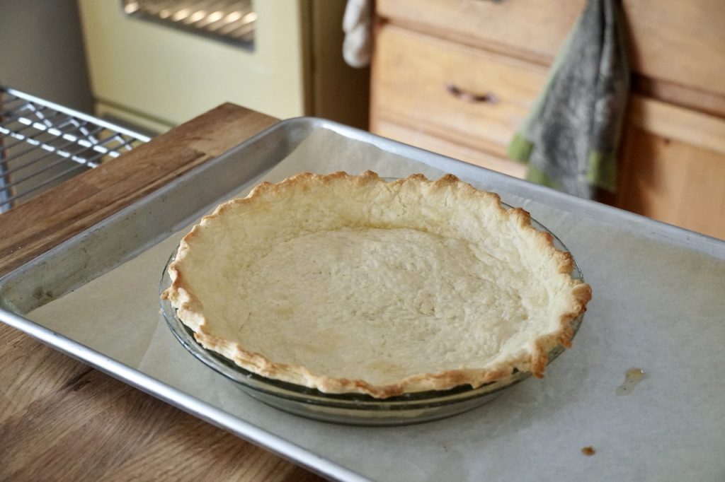 The blind-baked pie shell fresh from the oven.