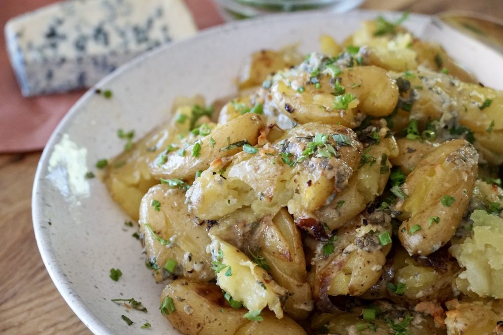 Smashed potatoes with Blue Cheese.