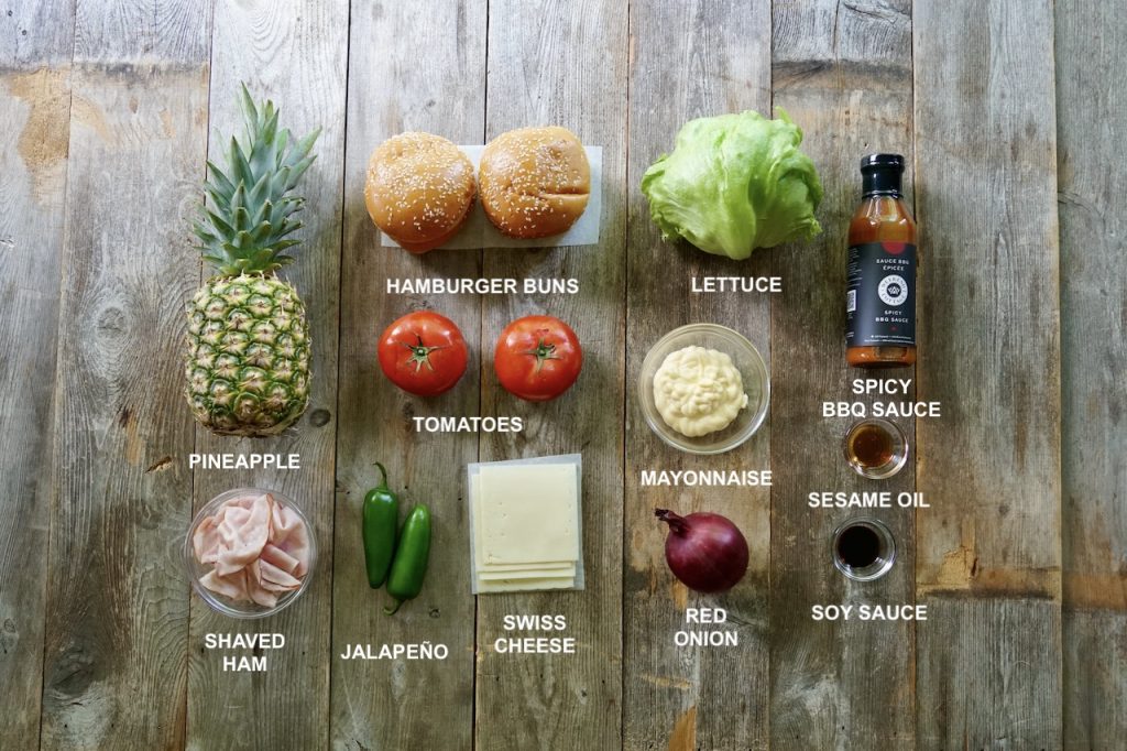 All of the ingredients needed to serve Grilled Hawaiian Chicken Burgers.