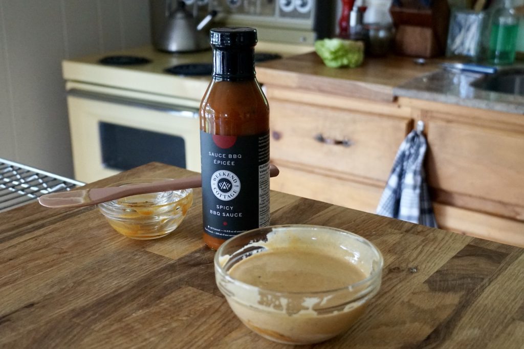 Spicy mayonnaise made with Weekend at the Cottage Spicy BBQ Sauce stirred up in a bowl.