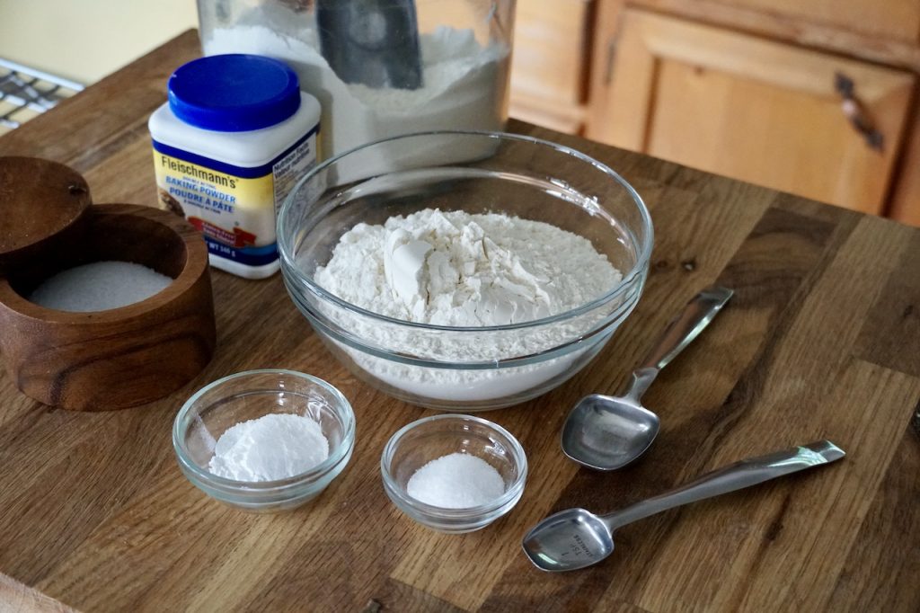 Ingredients to make self-rising flour include: unbleached all-purpose flour, kosher sat and baking powder.