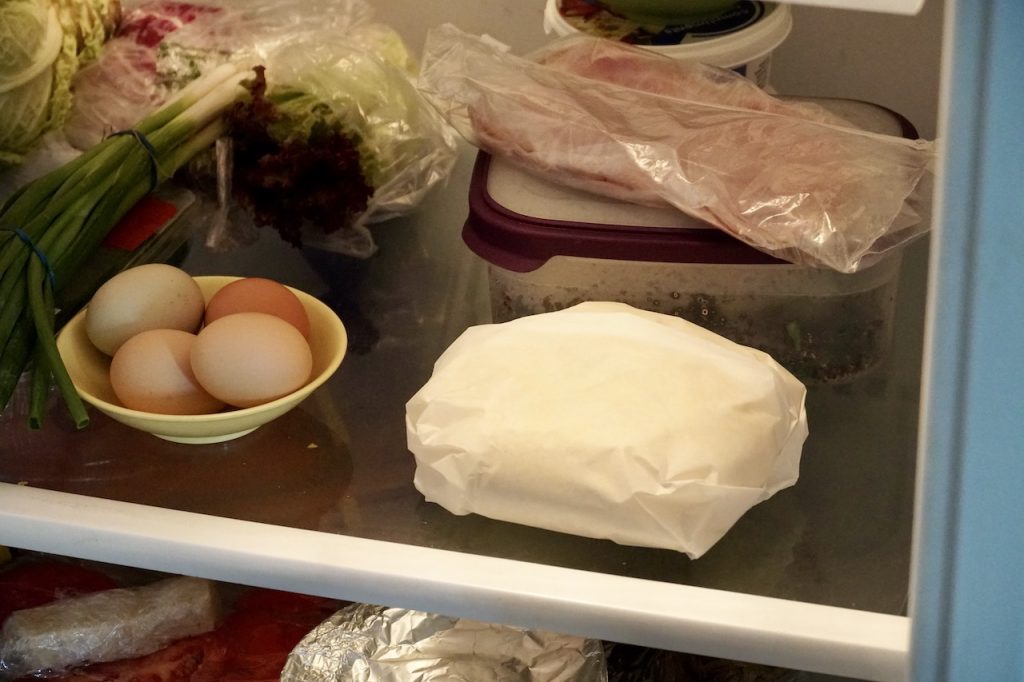 The flatbread dough chilling ion the fridge.