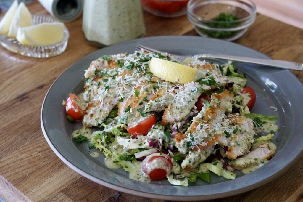 Crispy pork schnitzel Salad with crunchy slaw.