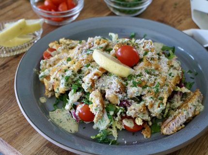 Crispy pork schnitzel with crunchy slaw.