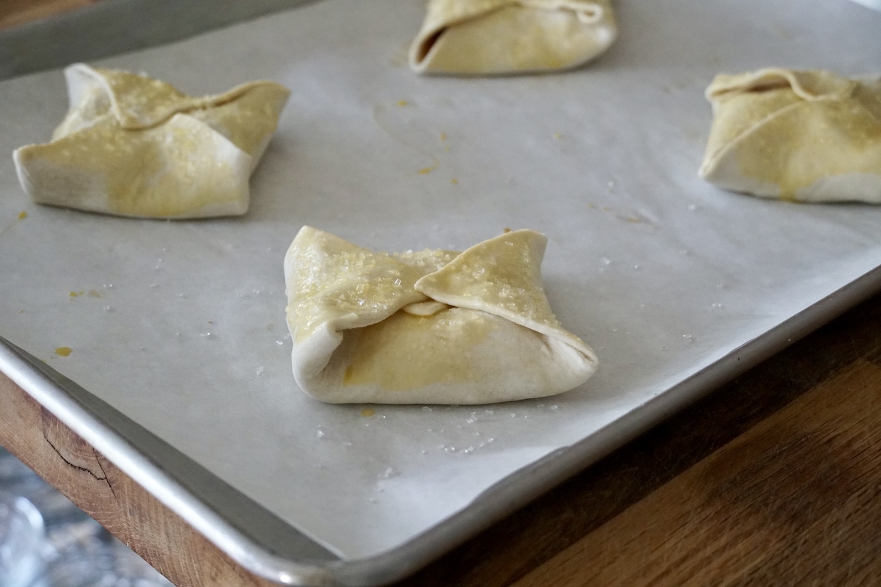 Peach turnovers folded blossom style.