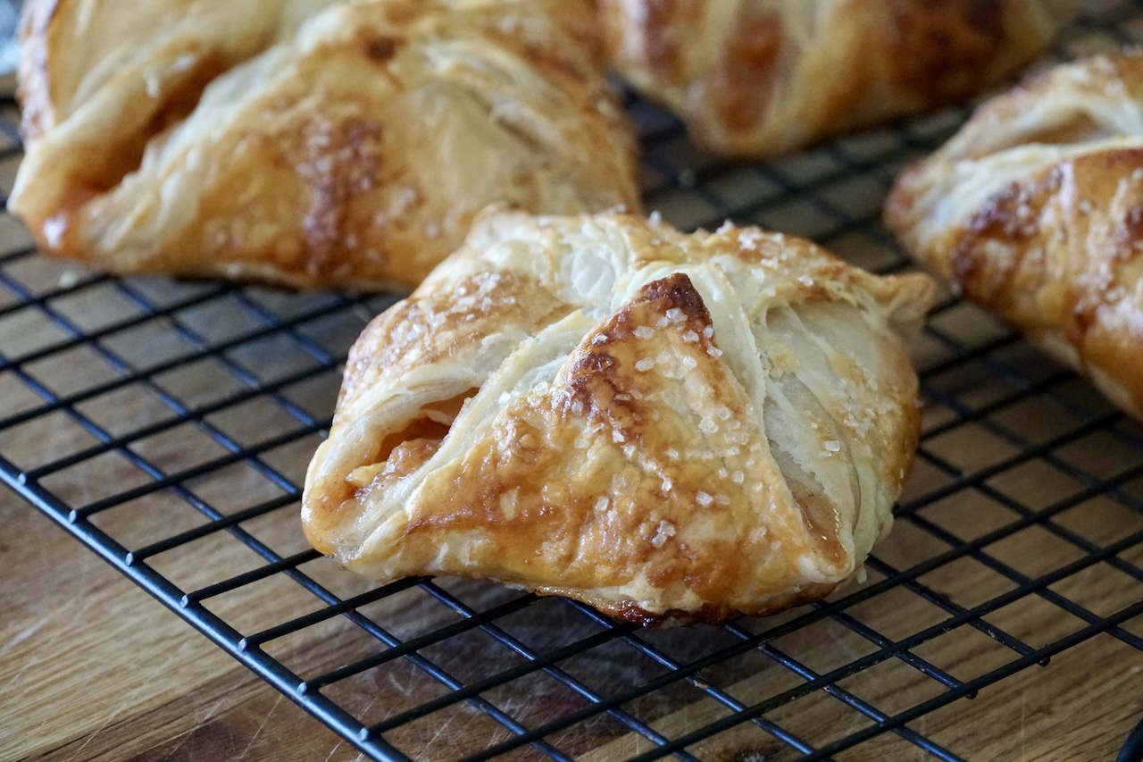 Fresh peach turnovers in the blossom style.