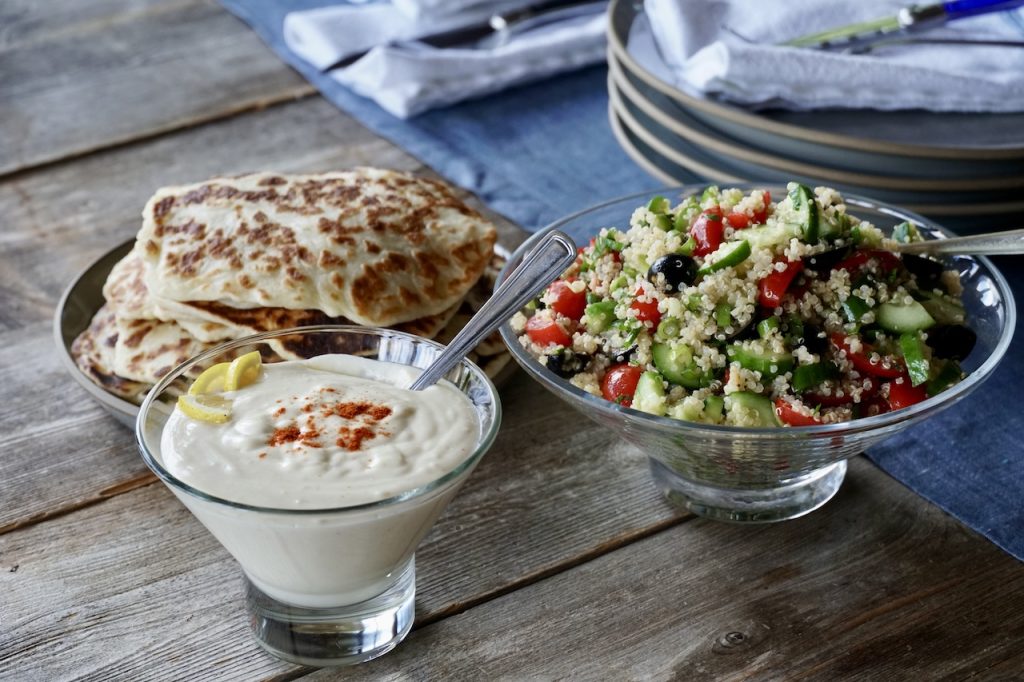 The kebabs can be served with the tahini-yoghurt sauce, an easy summer salad and freshly prepared flatbreads.