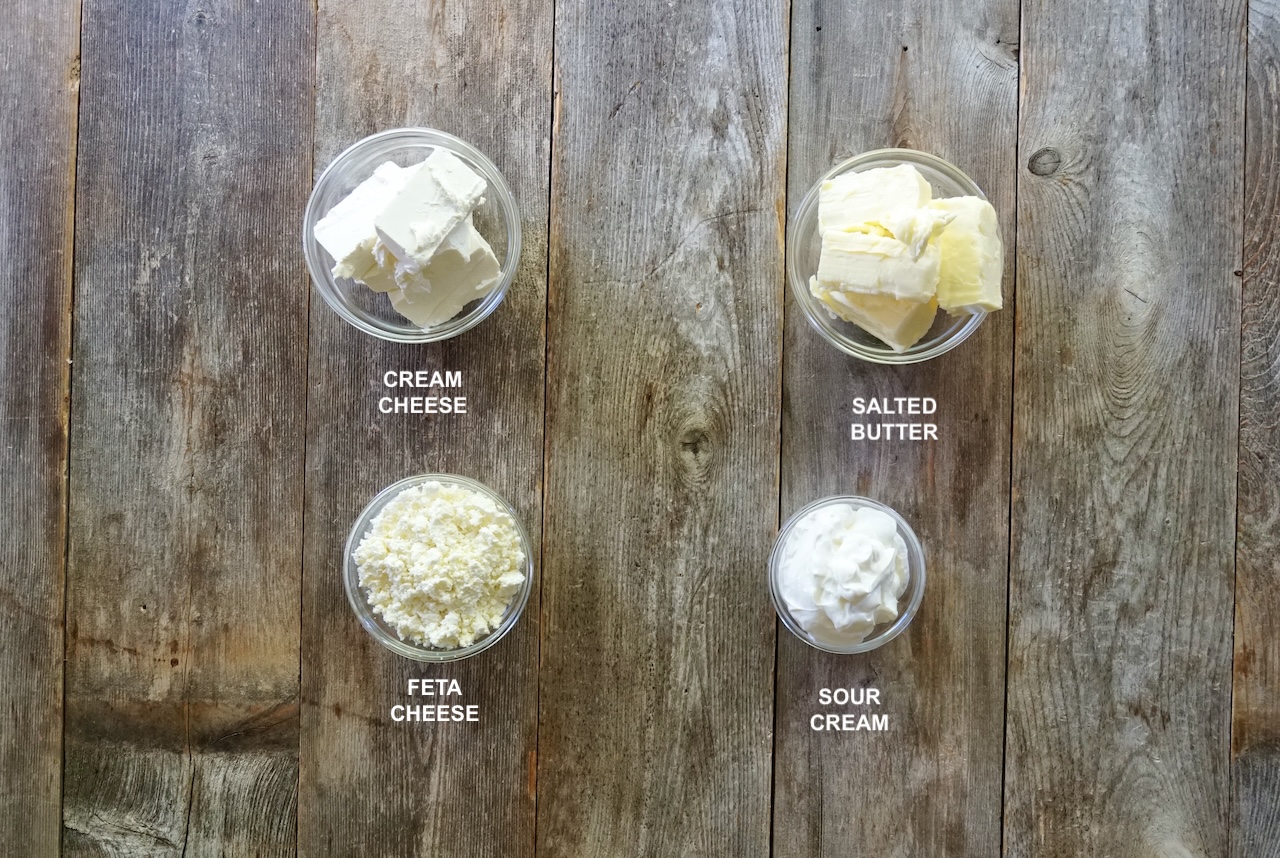 Ingredients for Kajmak, a Serbian clotted cream include: cream cheese, sour cream, salted butter and feta cheese.