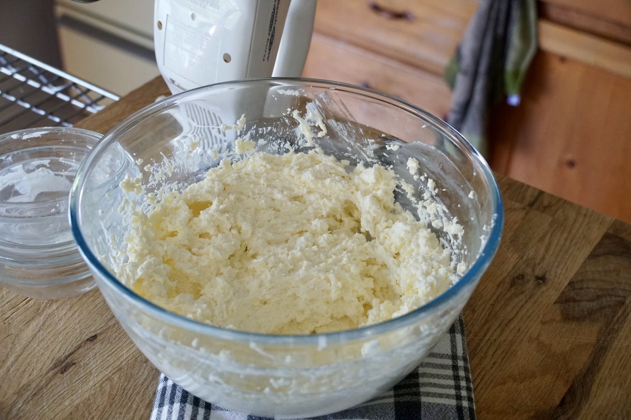 The kajmak cream cheese mixture blended together in a large mixing bowl.