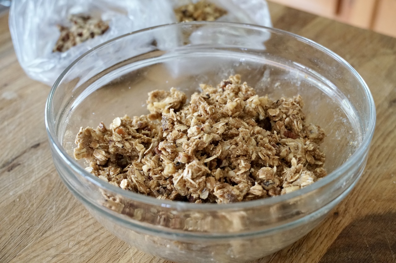 The topping for the fresh fruit rubbed together in a medium bowl.
