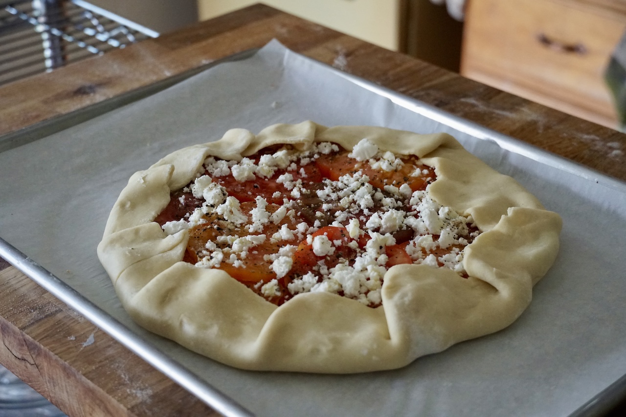The galette after the sides have been folded up to cover the edge.