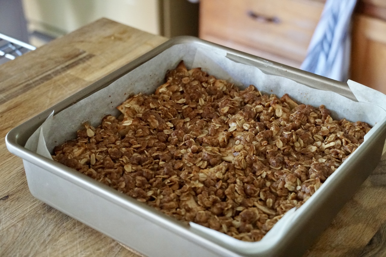 The apple pie crumble bar recipe fresh from the oven with the top baked to a pleasing golden brown.