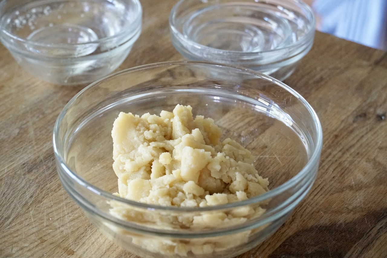 The raw shortbread base assembled in a bowl.