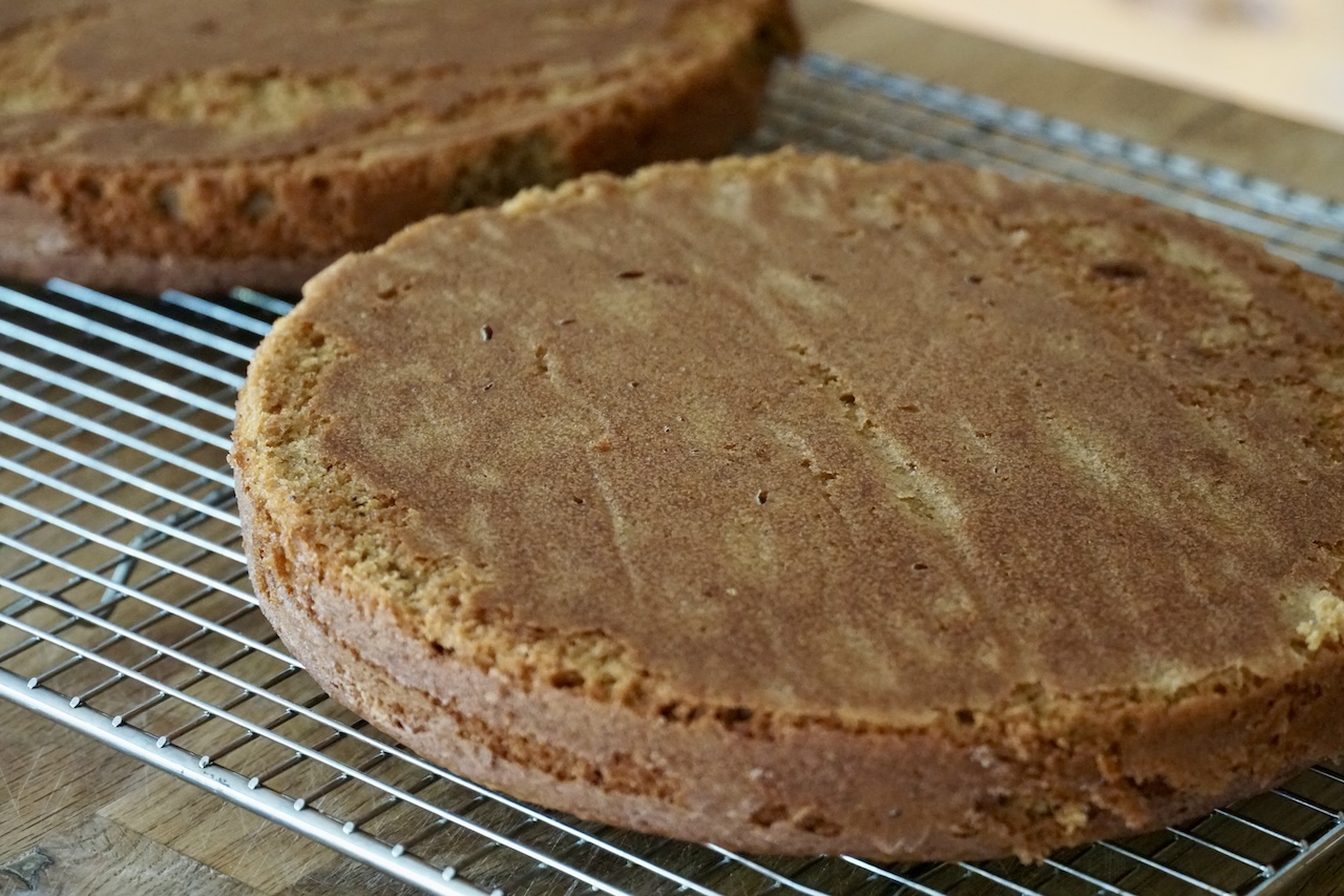 The spiced pumpkin cakes inverted from their pans, cooling on a wire rack.