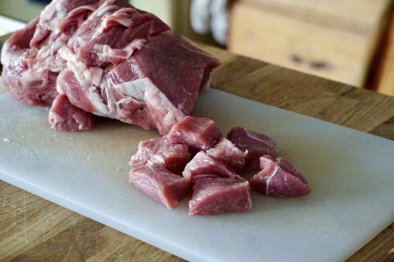 The veal shoulder trimmed of fat, cut into large chunks.