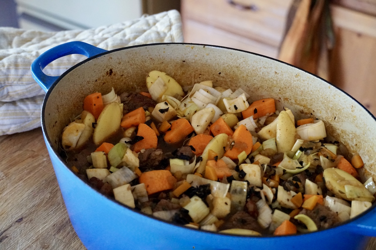 The carrots, leeks, potatoes and parsnip added to the stew pot.